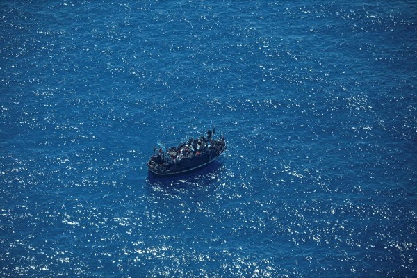 Boat with 400 migrants adrift off Malta with captain fleeing