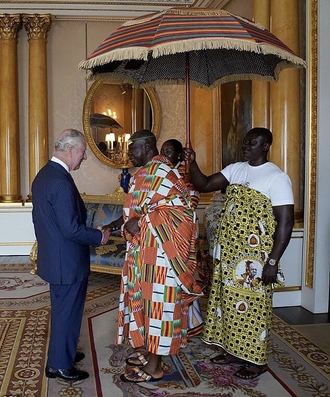 King Charles greets The King of The Ashanti and Lady Julia Osei Tutu ahead of Coronation